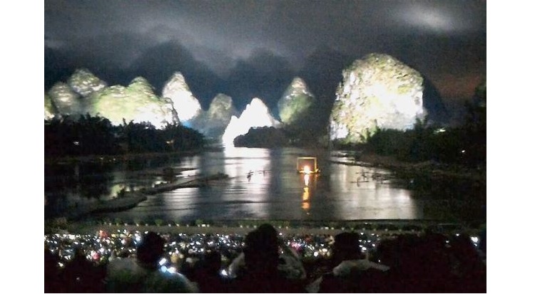 Spectacular: Laser technology is used in the lighting of the Impression Liu Sanjie show in China to make the river and surrounding mountain sides a part of the outdoor stage. — Photos: Handouts
